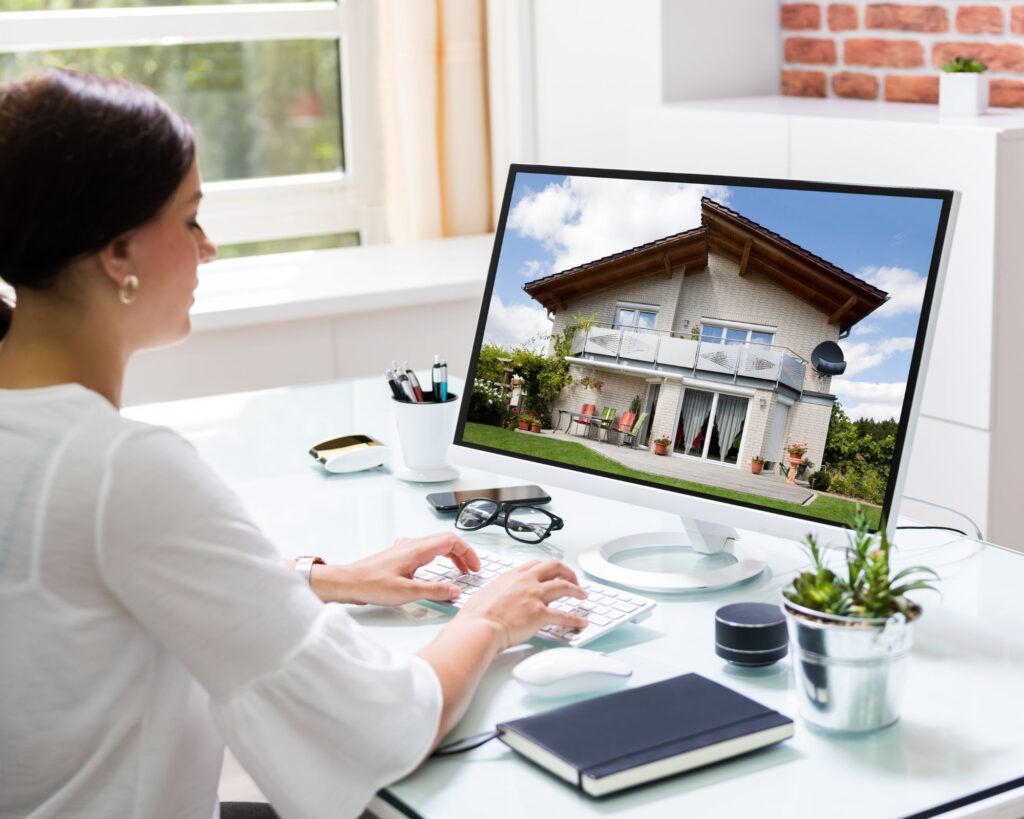 Real estate agent reviewing Minneapolis home listing with transaction coordinator support.